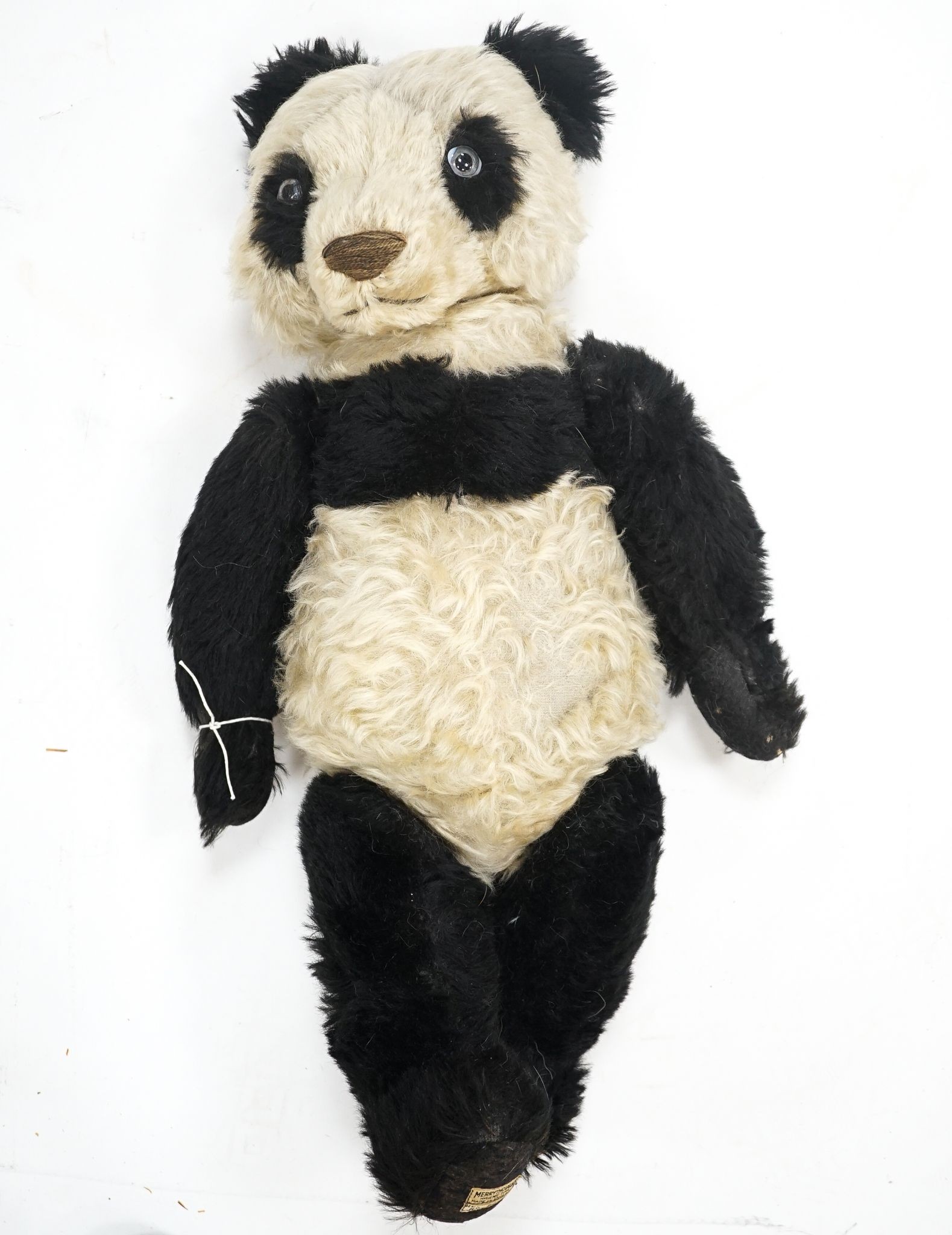 A Merrythought Panda 1930's Label Reg. Design, very good condition, slight thinning right side of tummy, 25in.